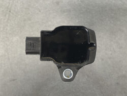 Small black automotive sensor with a mounting tab and left-side electrical connector.