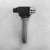 MAZ-COIL-P51R18100_1 MAZDA Genuine IGNITION COIL K4238 / LF2L-18-100 / LF, L3 Engine » NZ.95 » JDM-PARTS NZ » JDM-PARTS NZ Automotive ignition coil with spark plug boot on a gray textured surface, shown from the side for identification. MAZDA Genuine IGNITION COIL K4238 / LF2L-18-100 / LF, L3 Engine » JDM-PARTS NZ