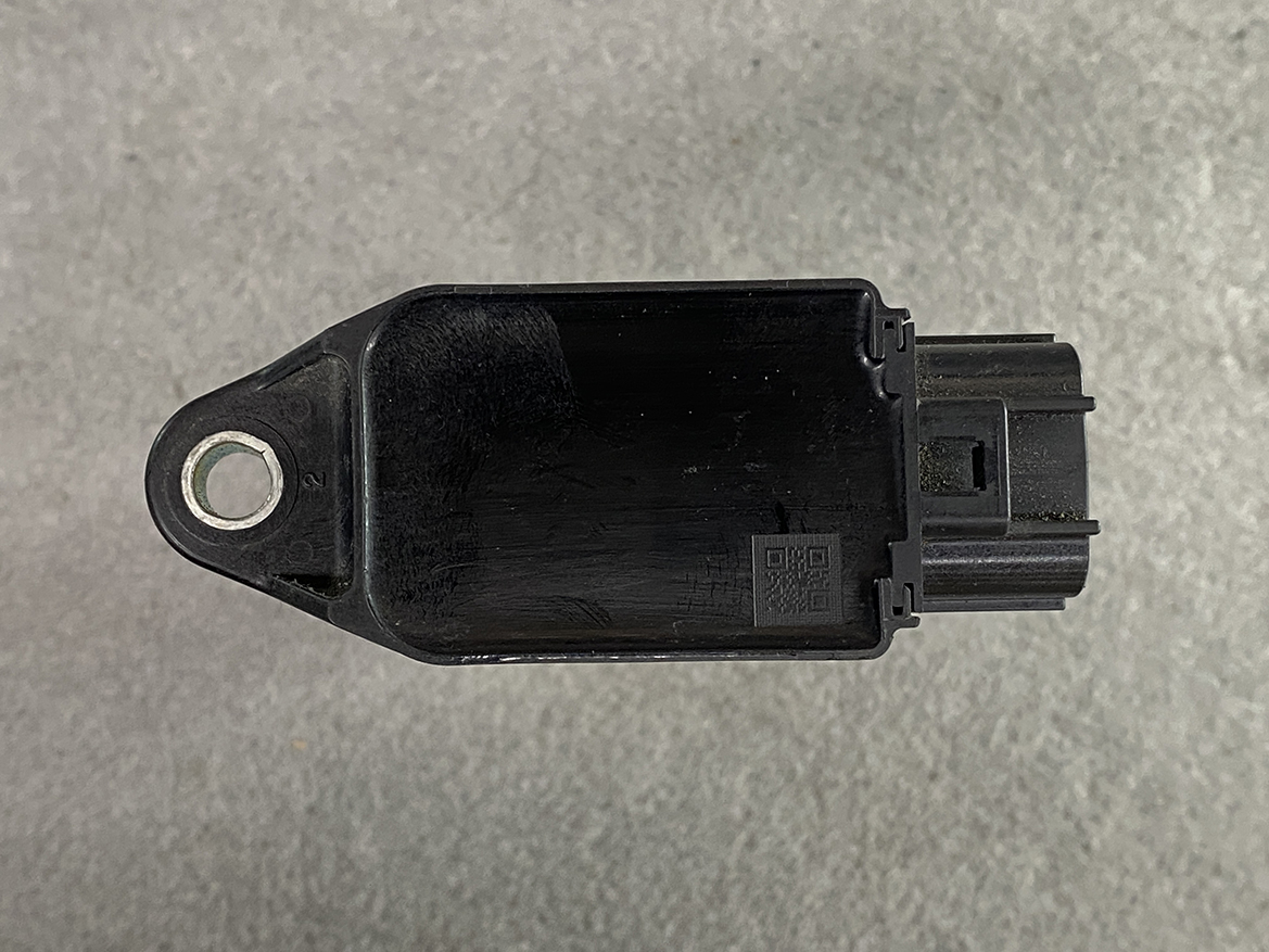 MAZ-COIL-P51R18100_6 MAZDA Genuine IGNITION COIL H6T15571 / P51R-18-100 SKYACTIV-G » NZ.95 » JDM-PARTS NZ » JDM-PARTS NZ Black plastic automotive sensor/module with a mounting hole on the left and a multi-pin connector on the right. MAZDA Genuine IGNITION COIL H6T15571 / P51R-18-100 SKYACTIV-G » JDM-PARTS NZ