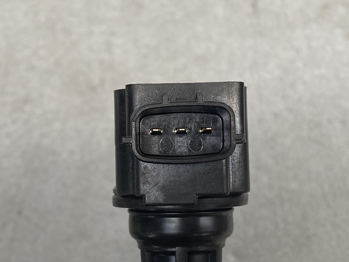 MAZ-COIL-ZJ20_3 MAZDA Genuine IGNITION COIL K5014 / ZJ20-18-100 / Z-series Engine » NZ.95 » JDM-PARTS NZ » JDM-PARTS NZ Close-up of a black four-pin electrical connector on a vehicle harness, showing metal contacts in a rectangular housing labeled 1 to 4. MAZDA Genuine IGNITION COIL K5014 / ZJ20-18-100 / Z-series Engine » JDM-PARTS NZ