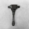 NIS-COIL-1KC0A_1 NISSAN Genuine IGNITION COIL 22448 JA00C / MR QR Engine » NZ.95 » JDM-PARTS NZ » JDM-PARTS NZ Automotive ignition coil with electrical connector on top, photographed on gray surface. NISSAN Genuine IGNITION COIL 22448 JA00C / MR QR Engine » JDM-PARTS NZ