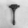 NIS-COIL-1KT0A_1 NISSAN RENAULT Genuine IGNITION COIL 22448 1KC0A / MR, QR Engine » NZ.95 » JDM-PARTS NZ » JDM-PARTS NZ Automotive ignition coil with electrical connector resting on a gray surface NISSAN RENAULT Genuine IGNITION COIL 22448 1KC0A / MR, QR Engine » JDM-PARTS NZ