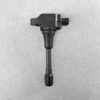 NIS-COIL-JA00C_1 HONDA Genuine IGNITION COIL CM11-121A / L-series Engine » NZ.95 » JDM-PARTS NZ » JDM-PARTS NZ Automotive ignition coil with a rubber boot on a gray textured surface HONDA Genuine IGNITION COIL CM11-121A / L-series Engine » JDM-PARTS NZ