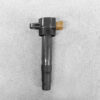 SUZ-COIL-DL3_1 SUZUKI Genuine IGNITION COIL FK0508 / R06A, K12B Engine » NZ.95 » JDM-PARTS NZ » JDM-PARTS NZ Ignition coil with a brown electrical connector on top, placed on a gray surface. SUZUKI Genuine IGNITION COIL FK0508 / R06A, K12B Engine » JDM-PARTS NZ