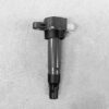 SUZ-COIL-DL4_1 SUZUKI Genuine IGNITION COIL / DL3 / 3731 / K12B, K6A, R06A Engine » NZ.95 » JDM-PARTS NZ » JDM-PARTS NZ Automotive fuel injector lying on a gray surface, showing metal body and plastic nozzle at the bottom. SUZUKI Genuine IGNITION COIL / DL3 / 3731 / K12B, K6A, R06A Engine » JDM-PARTS NZ