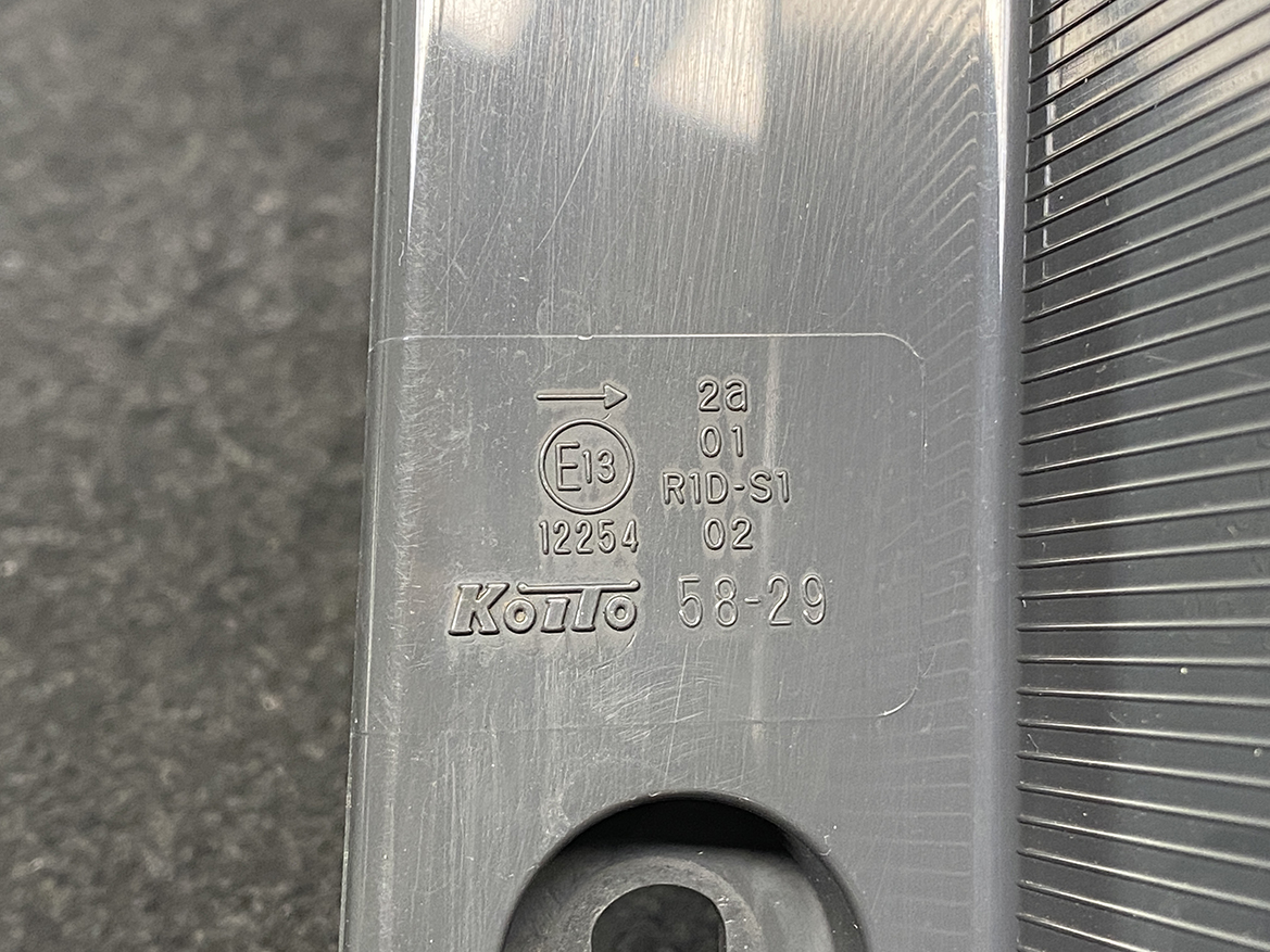 B390_2 TOYOTA ALPHARD VELLFIRE ANH20 Genuine Taillight KOITO 58-29 Right Side x1 » NZ1.95 » JDM-PARTS NZ » JDM-PARTS NZ Close-up of Koito automotive light housing with E13 approval mark and part numbers embossed on gray plastic. TOYOTA ALPHARD VELLFIRE ANH20 Genuine Taillight KOITO 58-29 Right Side x1 » JDM-PARTS NZ