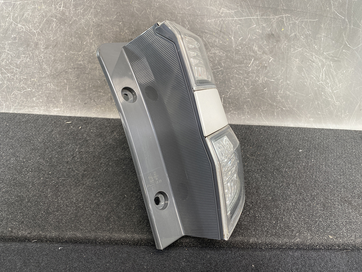 B390_4 TOYOTA ALPHARD VELLFIRE ANH20 Genuine Taillight KOITO 58-29 Right Side x1 » NZ1.95 » JDM-PARTS NZ » JDM-PARTS NZ Plastic car tail light housing laid on its side, showing two mounting holes and clear lens sections. TOYOTA ALPHARD VELLFIRE ANH20 Genuine Taillight KOITO 58-29 Right Side x1 » JDM-PARTS NZ