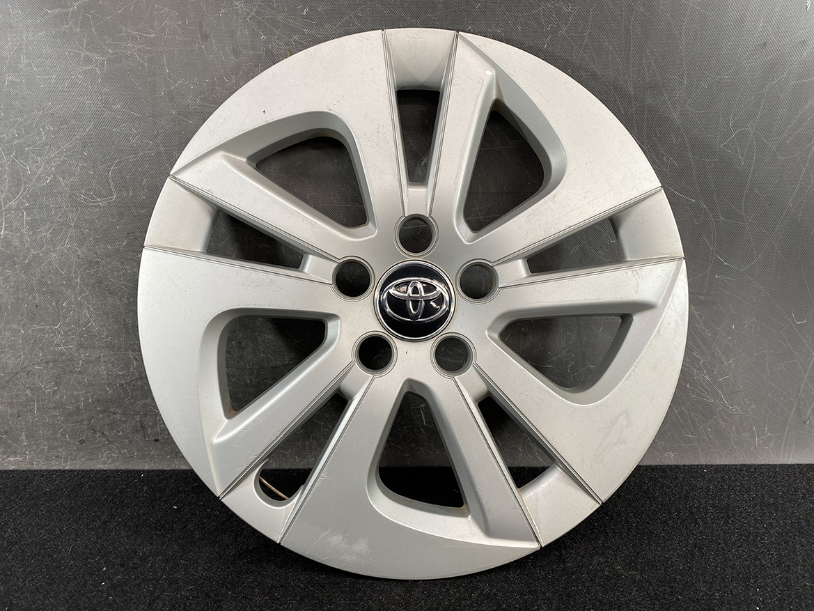 B402_2 TOYOTA PRIUS ZVW50 ZVW51 Genuine 15inch WHEEL CAP / HUB CAP » NZ.95 » JDM-PARTS NZ » JDM-PARTS NZ Silver Toyota alloy wheel cover with ten spokes and a central Toyota emblem TOYOTA PRIUS ZVW50 ZVW51 Genuine 15inch WHEEL CAP / HUB CAP » JDM-PARTS NZ