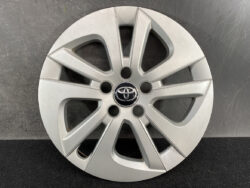 Silver Toyota alloy wheel cover with a multi-spoke design and a central Toyota emblem