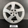 B409_1 TOYOTA PRIUS ZVW30 ZVW35 Genuine 15inch WHEEL CAP / HUB CAP » NZ.95 » JDM-PARTS NZ » JDM-PARTS NZ Silver Toyota wheel cover with five spokes and the Toyota emblem in the center, standing upright on a dark surface. TOYOTA PRIUS ZVW30 ZVW35 Genuine 15inch WHEEL CAP / HUB CAP » JDM-PARTS NZ