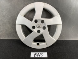 Silver Toyota alloy wheel cover with five spokes and centered Toyota emblem.