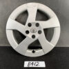 B412_1 TOYOTA PRIUS ZVW30 ZVW35 Genuine 15inch WHEEL CAP / HUB CAP » NZ.95 » JDM-PARTS NZ » JDM-PARTS NZ Silver Toyota hubcap with five-spoke design and central emblem on a dark surface, label reads B412 nearby TOYOTA PRIUS ZVW30 ZVW35 Genuine 15inch WHEEL CAP / HUB CAP » JDM-PARTS NZ