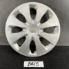 Silver Toyota hubcap with a multi-spoke design and center emblem on a black surface. TOYOTA PRIUS C AQUA NHP10 Genuine 15inch WHEEL CAP / HUB CAP 42602-52540 x1 » JDM-PARTS NZ