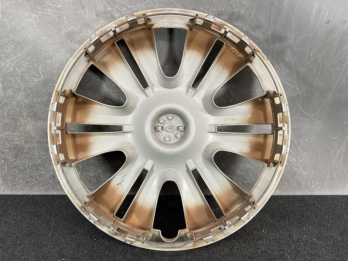 B422_3 NISSAN Genuine 15inch WHEEL CAP / HUB CAP 40315-1GK0A x1 » NZ.95 » JDM-PARTS NZ » JDM-PARTS NZ Silver car wheel rim with multiple spokes, showing rust and wear, set against a dark textured background NISSAN Genuine 15inch WHEEL CAP / HUB CAP 40315-1GK0A x1 » JDM-PARTS NZ