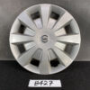 Silver Nissan hubcap with a multi-spoke design and central Nissan badge on a dark surface NISSAN TIIDA C11 Genuine 15inch WHEEL CAP / HUB CAP 40315 ED000 x1 » JDM-PARTS NZ