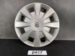 Silver Nissan wheel cover/hubcap with a segmented spoke design and Nissan emblem center NISSAN TIIDA C11 Genuine 15inch WHEEL CAP / HUB CAP 40315 ED000 x1 » JDM-PARTS NZ