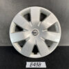 B438_1 NISSAN NOTE E11 Genuine 14inch WHEEL CAP / HUB CAP x1 40315 1U600 x1 » NZ.95 » JDM-PARTS NZ » JDM-PARTS NZ Silver Nissan hubcap with an eight-spoke design and center emblem, resting on a dark surface with minor scratches. NISSAN NOTE E11 Genuine 14inch WHEEL CAP / HUB CAP x1 40315 1U600 x1 » JDM-PARTS NZ