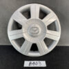 Silver Mazda hubcap with eight-spoke design and centered logo on a dark surface MAZDA DEMIO DY3W Genuine 14inch WHEEL CAP / HUB CAP x1 » JDM-PARTS NZ