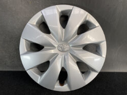 Silver Toyota hubcap with a multi-spoke design and central Toyota logo.
