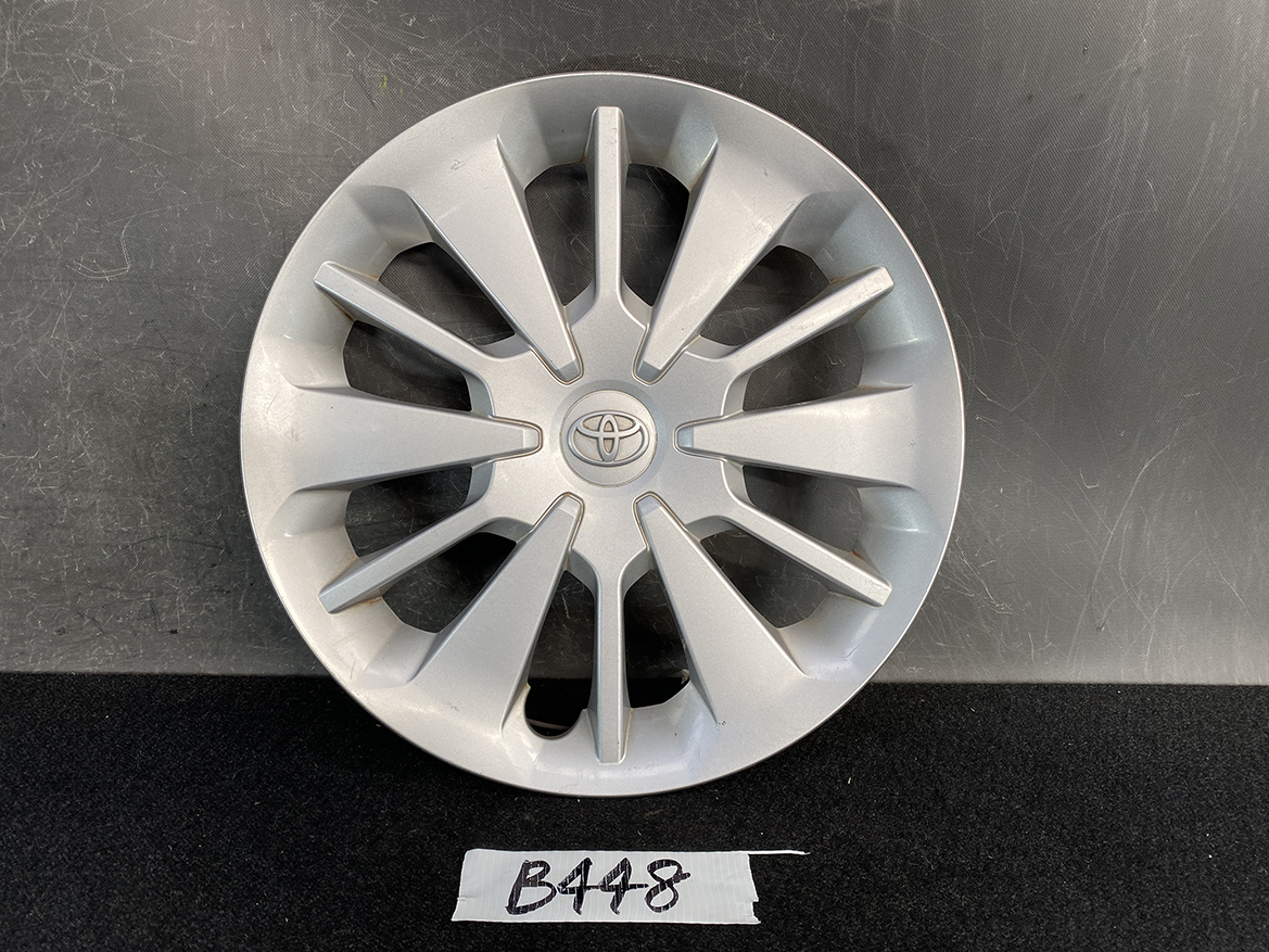 B448_1 TOYOTA PASSO M700A Genuine 14inch WHEEL CAP / HUB CAP x1 » NZ.95 » JDM-PARTS NZ » JDM-PARTS NZ Silver Toyota hubcap with a multi-spoke design displayed against a dark background TOYOTA PASSO M700A Genuine 14inch WHEEL CAP / HUB CAP x1 » JDM-PARTS NZ