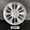 Silver Toyota alloy wheel cover with many angular spokes and a Toyota emblem in the center, displayed against a dark background. TOYOTA PASSO M700A Genuine 14inch WHEEL CAP / HUB CAP x1 » JDM-PARTS NZ