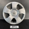 Front view of a silver Toyota wheel cover with visible scratches and a damaged bottom edge, placed on a dark surface with a labeled tag reading B456. TOYOTA SIENTA NCP81G Genuine 14inch WHEEL CAP / HUB CAP 42602-52350 x1 » JDM-PARTS NZ