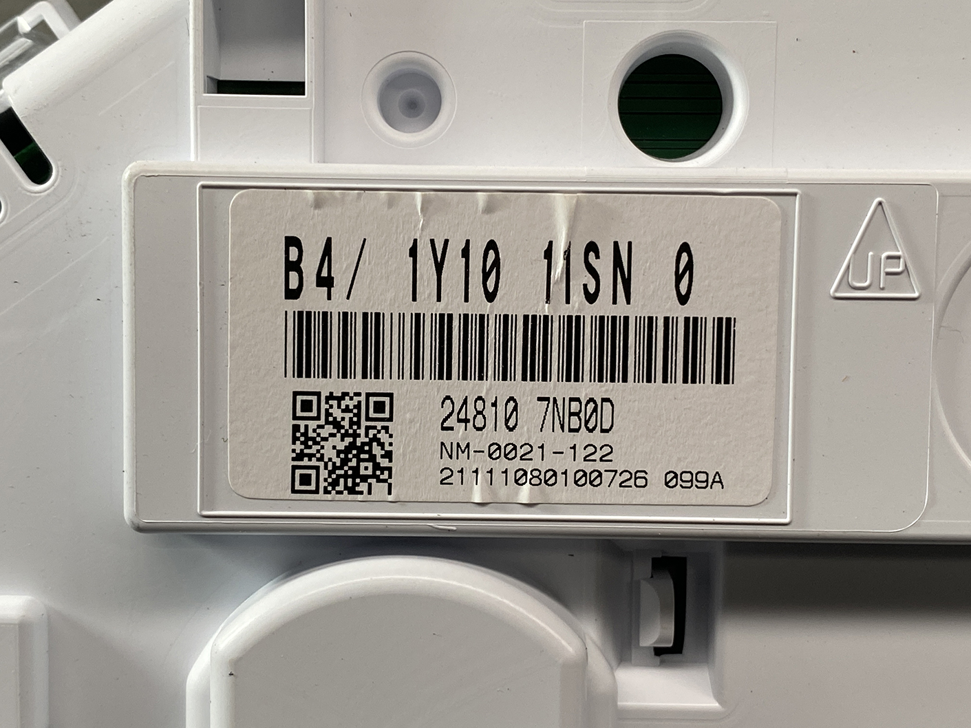 B466_2 NISSAN ROOX B44A Genuine Instrument Cluster 24810 7NB0D » NZ1.95 » JDM-PARTS NZ » JDM-PARTS NZ Close-up of a white electrical device label showing a barcode, a QR code, and the text B4/ 1Y10 11SN 0 with additional numeric lines underneath. NISSAN ROOX B44A Genuine Instrument Cluster 24810 7NB0D » JDM-PARTS NZ