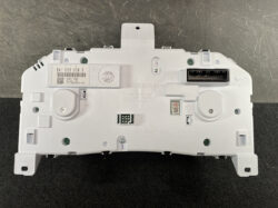 Back of a Nissan instrument cluster; white plastic housing with a large right-side multi-pin connector and mounting tabs.