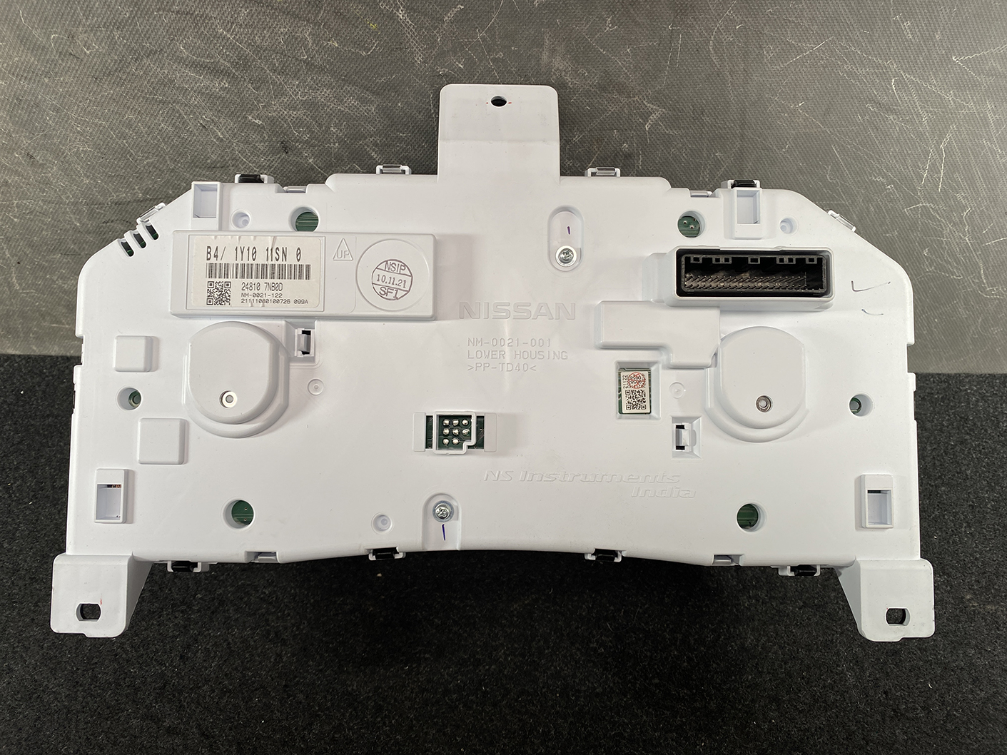 B466_5 NISSAN ROOX B44A Genuine Instrument Cluster 24810 7NB0D » NZ1.95 » JDM-PARTS NZ » JDM-PARTS NZ Back of a Nissan instrument cluster; white plastic housing with a large right-side multi-pin connector and mounting tabs. NISSAN ROOX B44A Genuine Instrument Cluster 24810 7NB0D » JDM-PARTS NZ