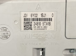 Label on Nissan back cover with a large barcode, QR code, and alphanumeric codes (J2/6Y02 1BJ1 0, 24810 5TA1B NM-0014-002)