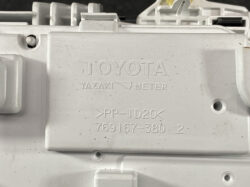 Close-up of a white automotive plastic module with embossed text: TOYOTA YAZAKI METER, followed by PP-TD20 and the part number 769167-380-2.
