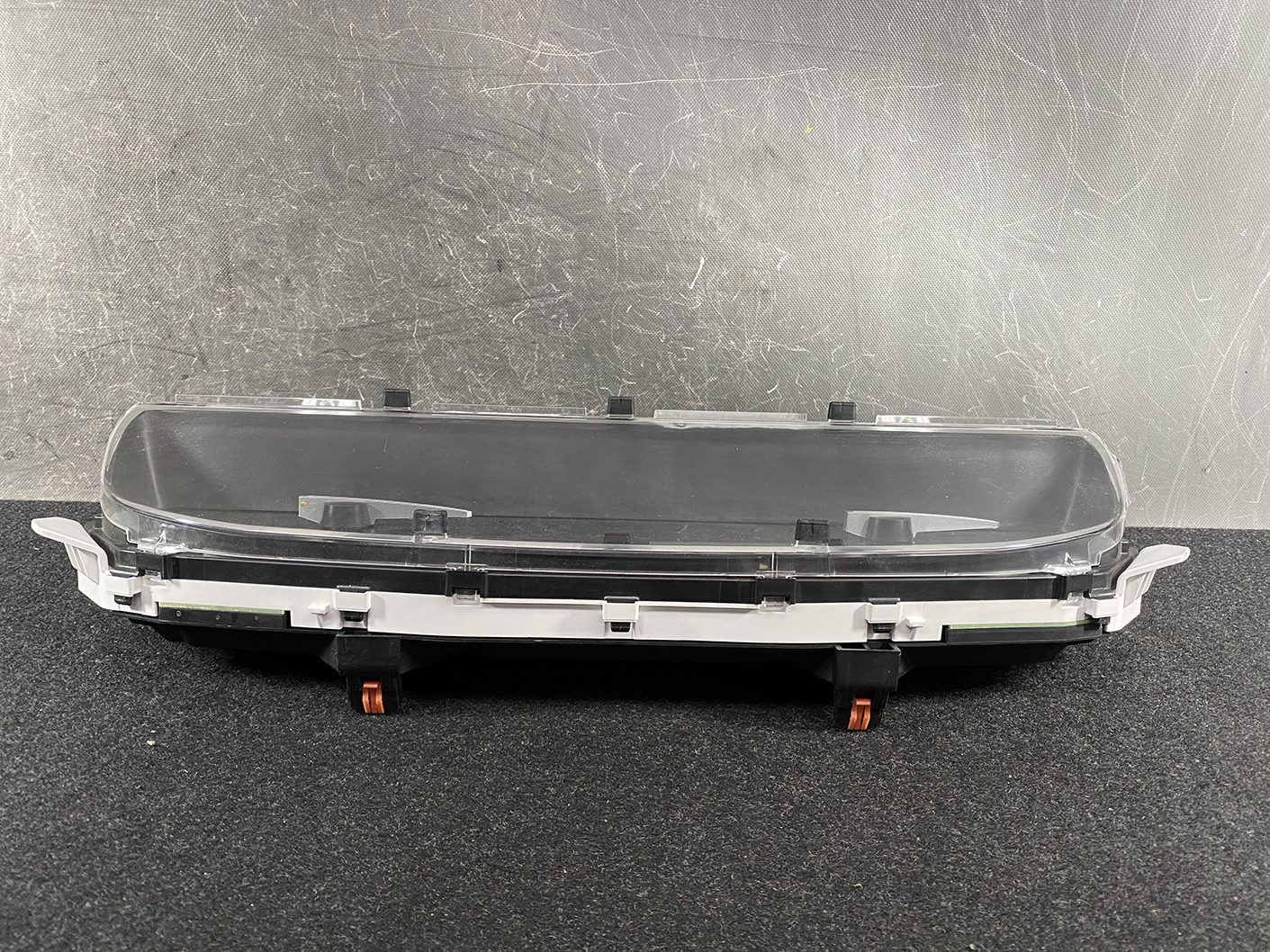 B474_8 TOYOTA SIENTA NHP170 Genuine Instrument Cluster 83800-5CP61 » NZ1.95 » JDM-PARTS NZ » JDM-PARTS NZ Automotive instrument cluster housing with a clear protective lens and mounting clips TOYOTA SIENTA NHP170 Genuine Instrument Cluster 83800-5CP61 » JDM-PARTS NZ