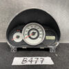 Car instrument cluster with central speedometer and left tachometer, digital display to the right, mounted on a black dashboard panel. TOYOTA PRIUS ZVW50 ZVW51 Genuine Instrument Cluster 83800-47L70-A » JDM-PARTS NZ