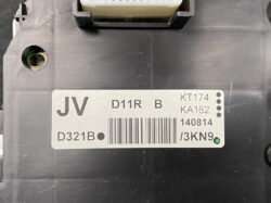 Close-up of an electrical control module with a barcode label reading JV and D11R, plus date 140814 and small green sticker.