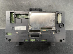 Vehicle ECU with metal shielding and a white multi-pin connector on the right side