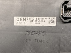 Close-up of a DENSO automotive control module label showing part numbers 34110-81P0 and 34102-81PA, 08N, a QR code, and serial 01U18 on a textured surface.
