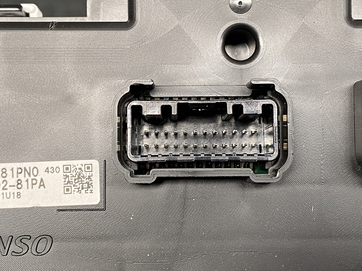 B481_4 SUZUKI SOLIO MITSUBISHI DELICA D2 Instrument Cluster 34110-81PN0 / 34102-81PA » NZ1.95 » JDM-PARTS NZ » JDM-PARTS NZ Close-up of a rectangular multi-pin electrical connector receptacle with many metal pins inside the plastic housing. SUZUKI SOLIO MITSUBISHI DELICA D2 Instrument Cluster 34110-81PN0 / 34102-81PA » JDM-PARTS NZ