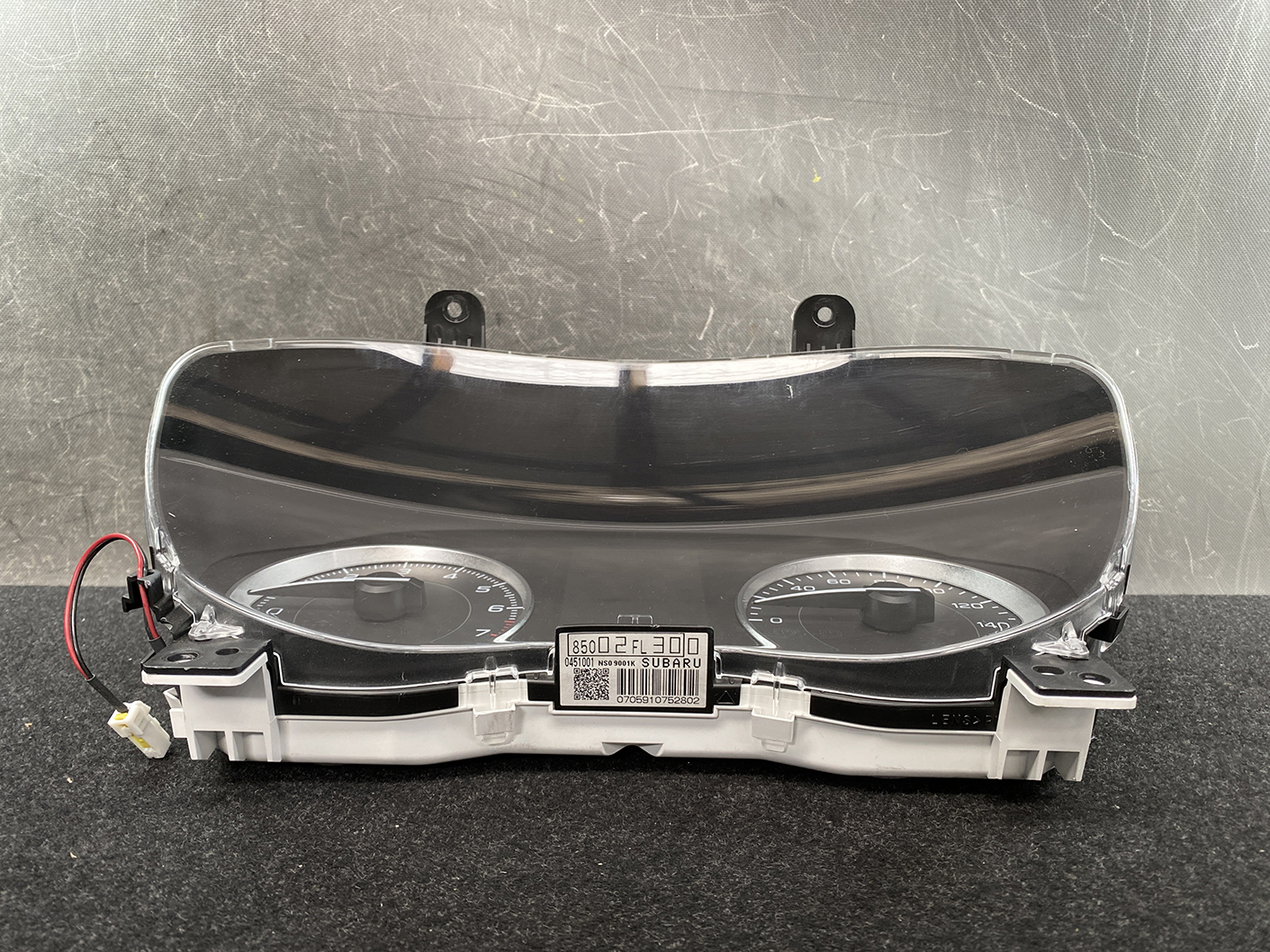 B484_7 SUBARU IMPREZA SPORTS GT2 Genuine Instrument Cluster 85002FL300 / NS0 9001K » NZ1.95 » JDM-PARTS NZ » JDM-PARTS NZ Detached car instrument cluster with clear LCD/cover, displaying speedometer and tachometer, Subaru branding on label below. SUBARU IMPREZA SPORTS GT2 Genuine Instrument Cluster 85002FL300 / NS0 9001K » JDM-PARTS NZ