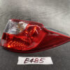 B485_1 MAZDA PREMACY CW NISSAN LAFESTA Taillight STANLEY P9377 L Left Side x1 » NZ1.95 » JDM-PARTS NZ » JDM-PARTS NZ Red car taillight assembly with clear reverse light section and curved shape on a dark surface. MAZDA PREMACY CW NISSAN LAFESTA Taillight STANLEY P9377 L Left Side x1 » JDM-PARTS NZ