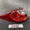 B486_1 MAZDA PREMACY CW NISSAN LAFESTA Taillight P9377 Right Side x1 » NZ1.95 » JDM-PARTS NZ » JDM-PARTS NZ Car tail light assembly with red lens and clear reverse light section on a dark surface. MAZDA PREMACY CW NISSAN LAFESTA Taillight P9377 Right Side x1 » JDM-PARTS NZ