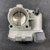 Throttle body intake with circular bore and two butterfly valves visible inside. Nissan SERENA SUZUKI LANDY C26 Genuine Throttle Body 526-01 » JDM-PARTS NZ