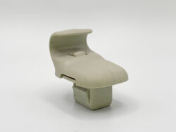 Beige plastic chair seat with curved backrest on a white background, mounted on a rectangular base.