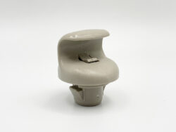 Beige plastic car seat adjustment knob with lever, photographed on a white background