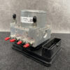Automotive ABS hydraulic modulator with four red-tipped connectors mounted on a black base Honda Genuine ABS Actuator Pump T5BJ0 / 57110-T5B-J02 » JDM-PARTS NZ