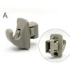Two angles of a gray plastic clamp-style fastener with a locking slot in the center. (Informative close-up) Nissan Genuine Sun Visor Clip  / Holder #C » JDM-PARTS NZ