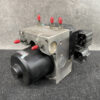 TOY-ACTR-24060_2 Subaru Forester Genuine ABS Pump Module Actuator 27536SC050 » NZ9.95 » JDM-PARTS NZ » JDM-PARTS NZ Automotive ABS pump and valve block with electrical connectors and red-tipped ports. Subaru Forester Genuine ABS Pump Module Actuator 27536SC050 » JDM-PARTS NZ