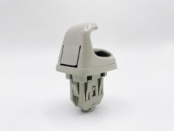 Gray plastic automotive gear knob with exposed modular mounting beneath the top cap (component for a vehicle shifter).