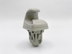 Gray plastic toy seat with backrest and base, shown against a white background.