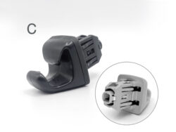 Close-up of a black plastic clamp with a separate gray connector part shown on a white background, both highlighted by circles.