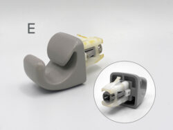 Close-up of a gray plastic connector housing with white and yellow internal parts, shown with circular callouts on a light background.